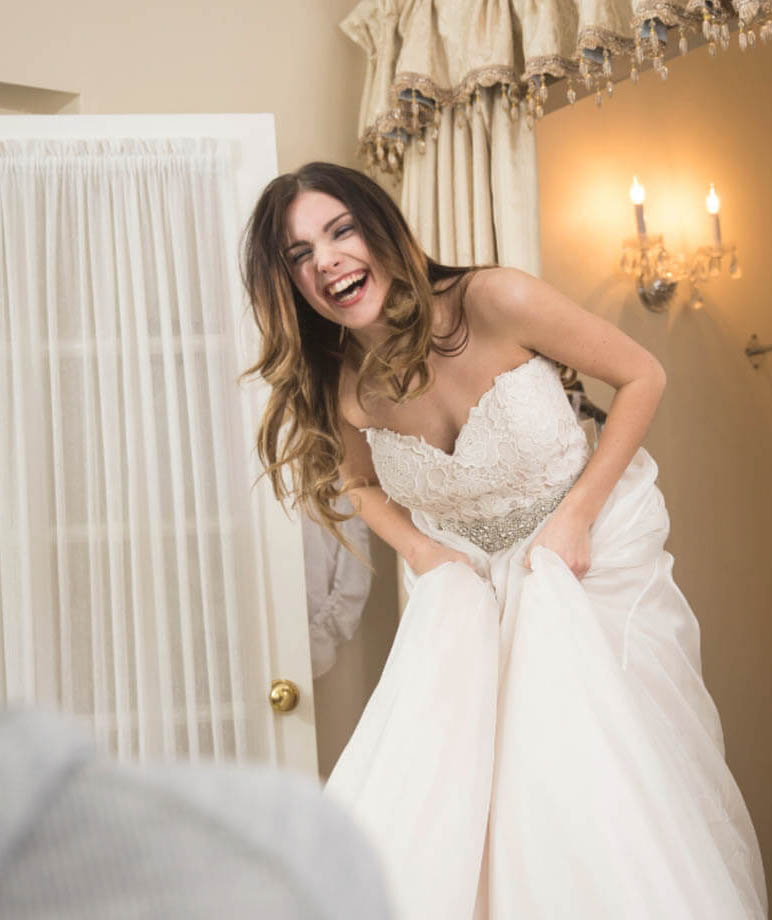 Model wearing a white gown